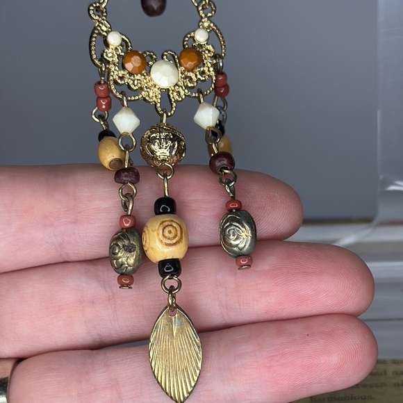 Bohemian Gold and Brown Chandelier Earrings with Leaf Charms - Picture 2 of 3